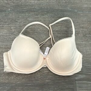 Victoria secret body by Victoria line. 32D cream color